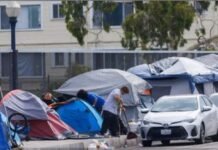 Trump signs order pushing cities and states to remove homeless people from streets