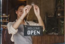 Seattle Encourages Residents to Shop Small This Holiday Season Open Sign on Door
