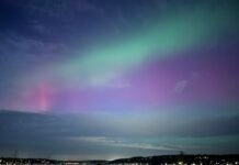 Northern Lights Dazzle Over Lake Washington Amid Strong Geomagnetic Storm Northern Lights Dazzle