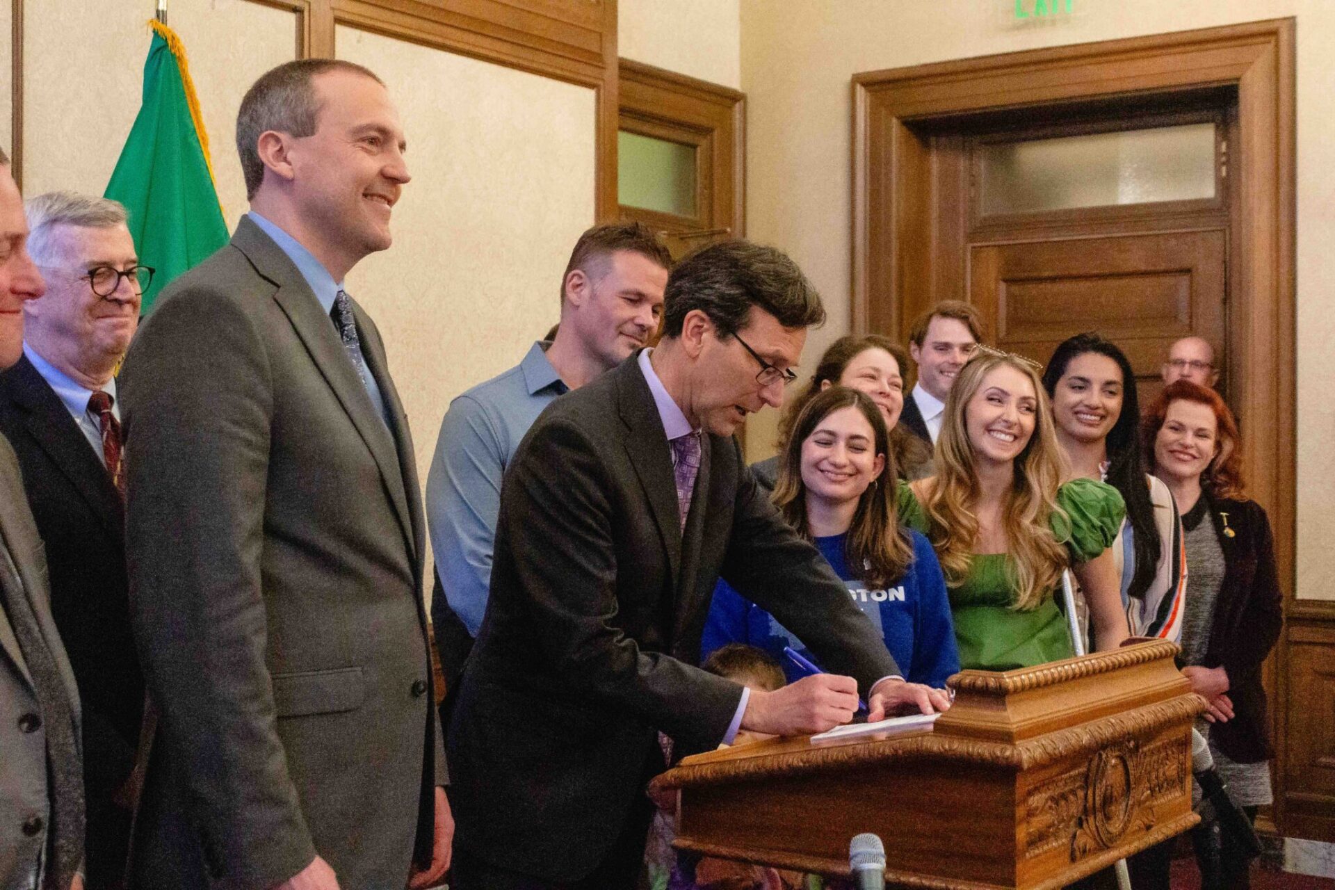 Gov. Bob Ferguson signing Senate Bill 5480