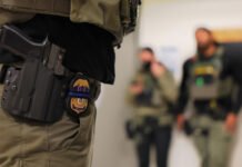 Immigration arrests in WA surged in recent months An Immigration and Customs Enforcement officer’s badge