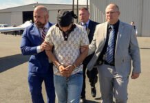 Florida Lt. Gov. Jay Collins, left, participates in the extradition from California of Harjinder Singh, accused of causing a crash that killed three people in Florida