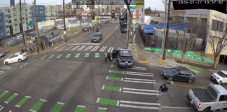 Seattle police chase after a felony warrant suspect tossing cash and drugs during a narcotics operation (RTCC).