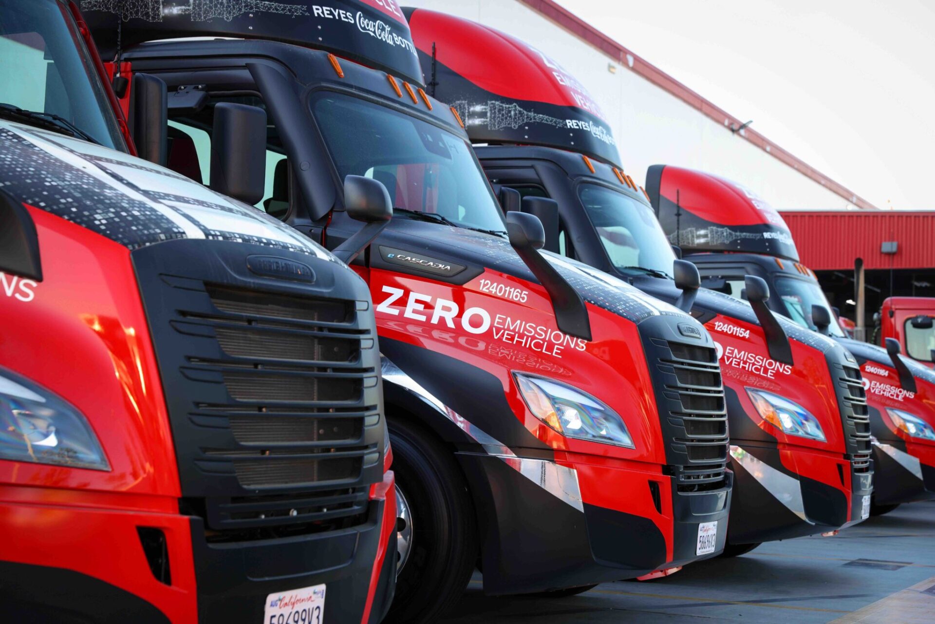 Freightliner eCascadia electric trucks used in a Coca-Cola Bottling fleet are pictured in 2023