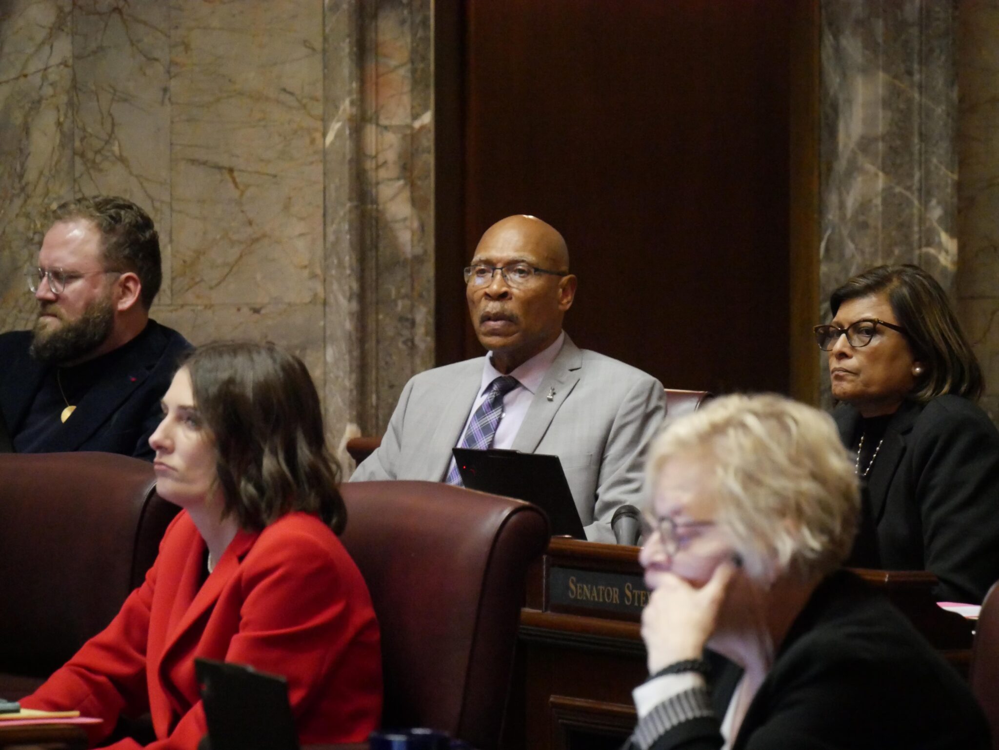 State Sen. John Lovick, D-Mill Creek, looks on toward the end of the roll call vote for his Senate Bill 5067, which would lower the blood alcohol limit for drunk driving to 0.05% from 0.08% in Washington. The bill passed the Senate on a 26-23 vote on Jan. 28, 2026. (Photo by Bill Lucia/Washington State Standard)