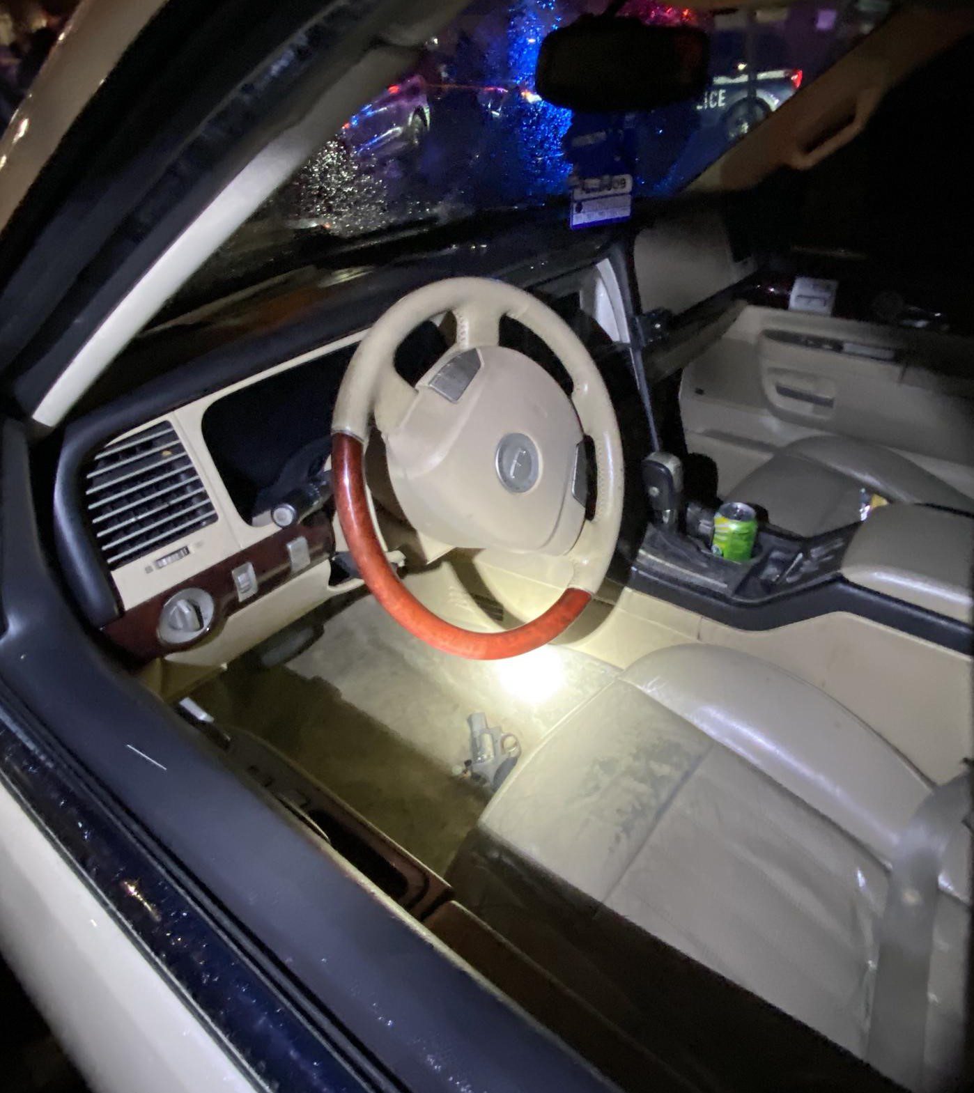 Seattle police recovered a firearm (center/floorboard) during the arrest of a violent felon on federal probation.