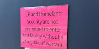 A sign hangs that says “ICE and Homeland Security are not permitted to enter the facility without a valid judicial warrant,” at Cascade Unitarian Universalist Fellowship in East Wenatchee.