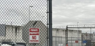 WA lawmakers target immigrant detention center with tax, fine and oversight bills A “no trespassing” sign outside of Northwest ICE Processing Center, also known as Northwest Detention Center.