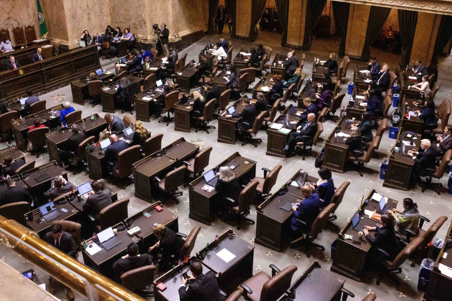 Washington state lawmakers in the House chamber on the first day of the 2026 legislative session