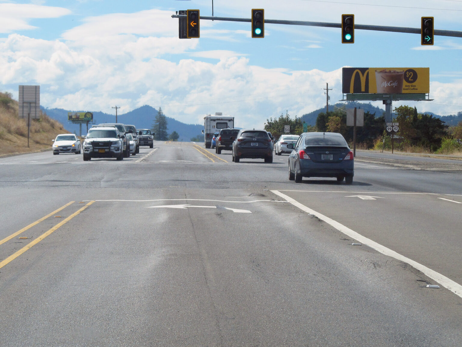 Rutted pavement on the left turn lane from westbound Oregon 42 onto Grant Smith Road in 2022. (Photo by Oregon Department of Transportation)