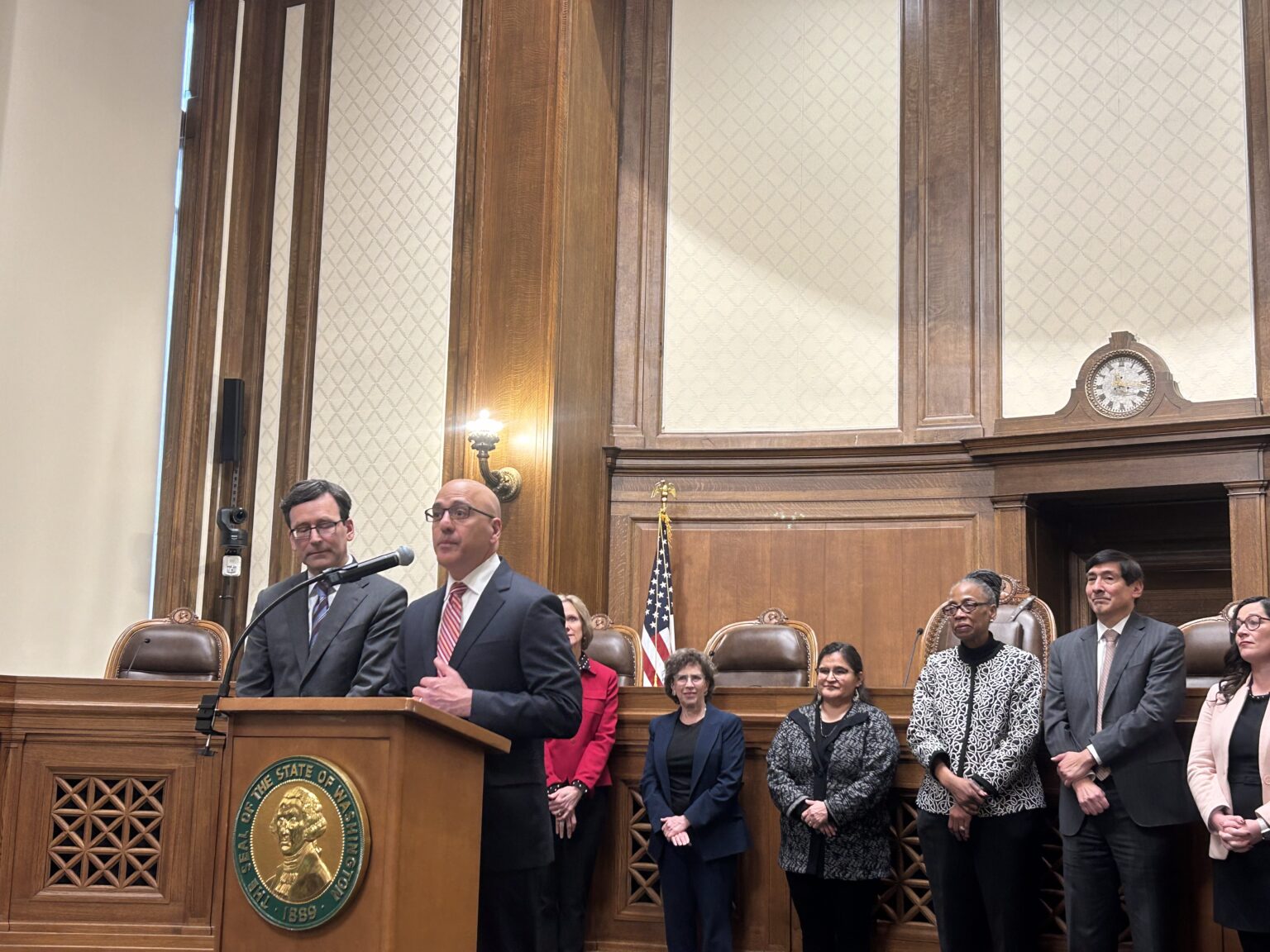 New Washington state Supreme Court Justice speaks to family, friends and media as he is appointed to the court by Gov. Bob Ferguson on Monday, March 9, 2026, in Olympia. (Photo by Jake Goldstein-Street/Washington State Standard)