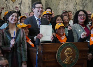 Nannies, housekeepers and other domestic workers to gain state protections in WA Governor Bob Ferguson appears with supporters of the bill after signing the legislation into law on March 9, 2026. House Bill 2355 establishes labor rights for nannies, gardeners and other domestic workers
