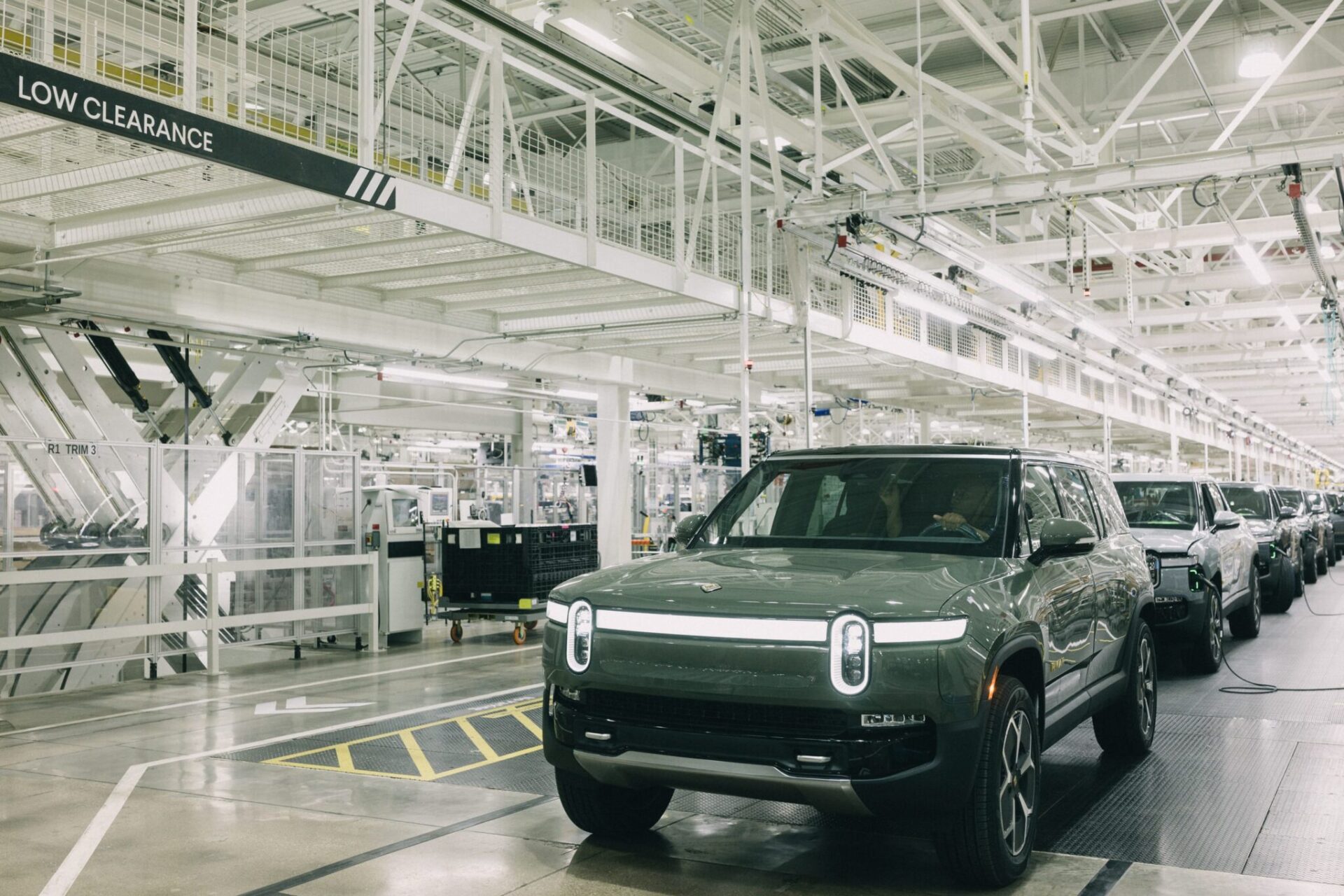 Rivian vehicles lined up at one of the company’s manufacturing facilities.