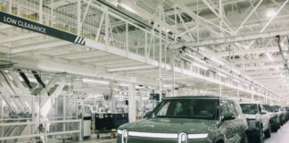 For Rivian and Lucid, path finally emerges for direct-to-consumer car sales in WA Rivian vehicles lined up at one of the company’s manufacturing facilities.