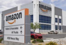 Amazon and Walmart fined for selling banned refrigerant in WA Cars sit in the parking lot at an Amazon distribution center in Las Vegas in 2019