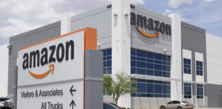 Amazon and Walmart fined for selling banned refrigerant in WA Cars sit in the parking lot at an Amazon distribution center in Las Vegas in 2019