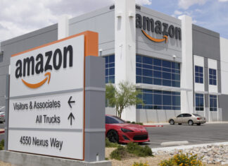 Amazon and Walmart fined for selling banned refrigerant in WA Cars sit in the parking lot at an Amazon distribution center in Las Vegas in 2019