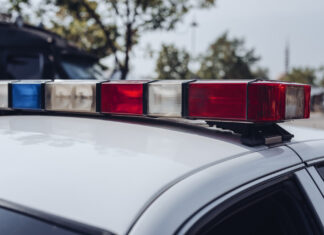 First grants awarded under WA’s new $100M police hiring program Emergency lights on a us police car