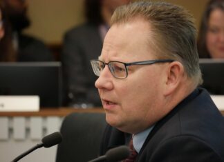 Superintendent of Public Instruction Chris Reykdal testifies during a committee hearing on Jan. 22, 2026