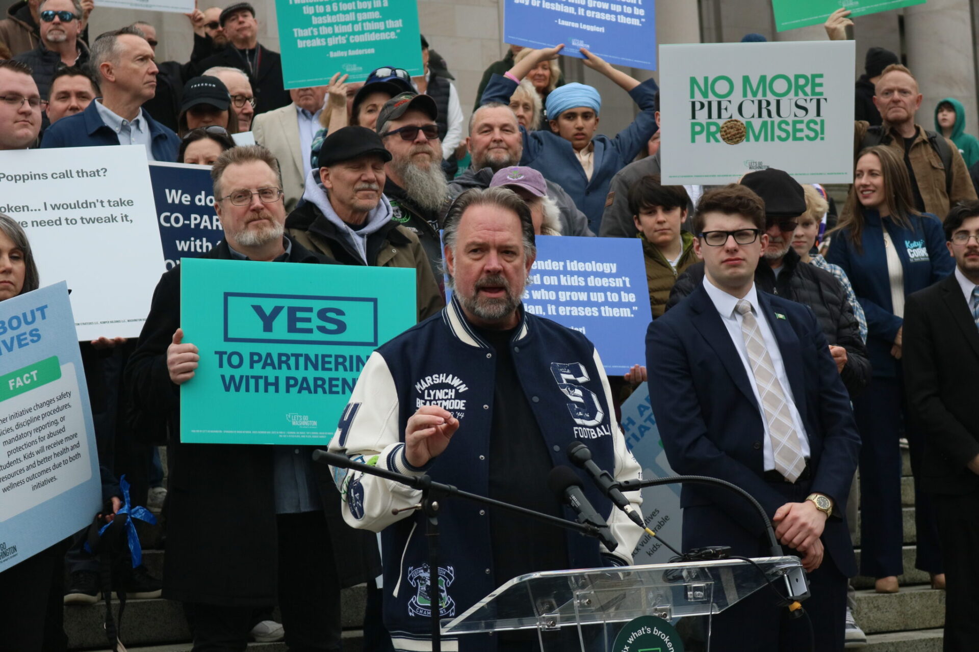Let's Go Washington founder Brian Heywood asked the Washington Supreme Court on Friday to allow a referendum effort on the state's new income tax law. Heywood is pictured at a rally in February on the group's initiatives to bolster parental rights and block transgender participants from girls' sports that are on the ballot in November