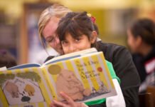 Frustration boils up after Ferguson vetoes two tiny grants in WA budget A mother and daughter take part in the Prime Time Family Reading Program in Kennewick, Washington