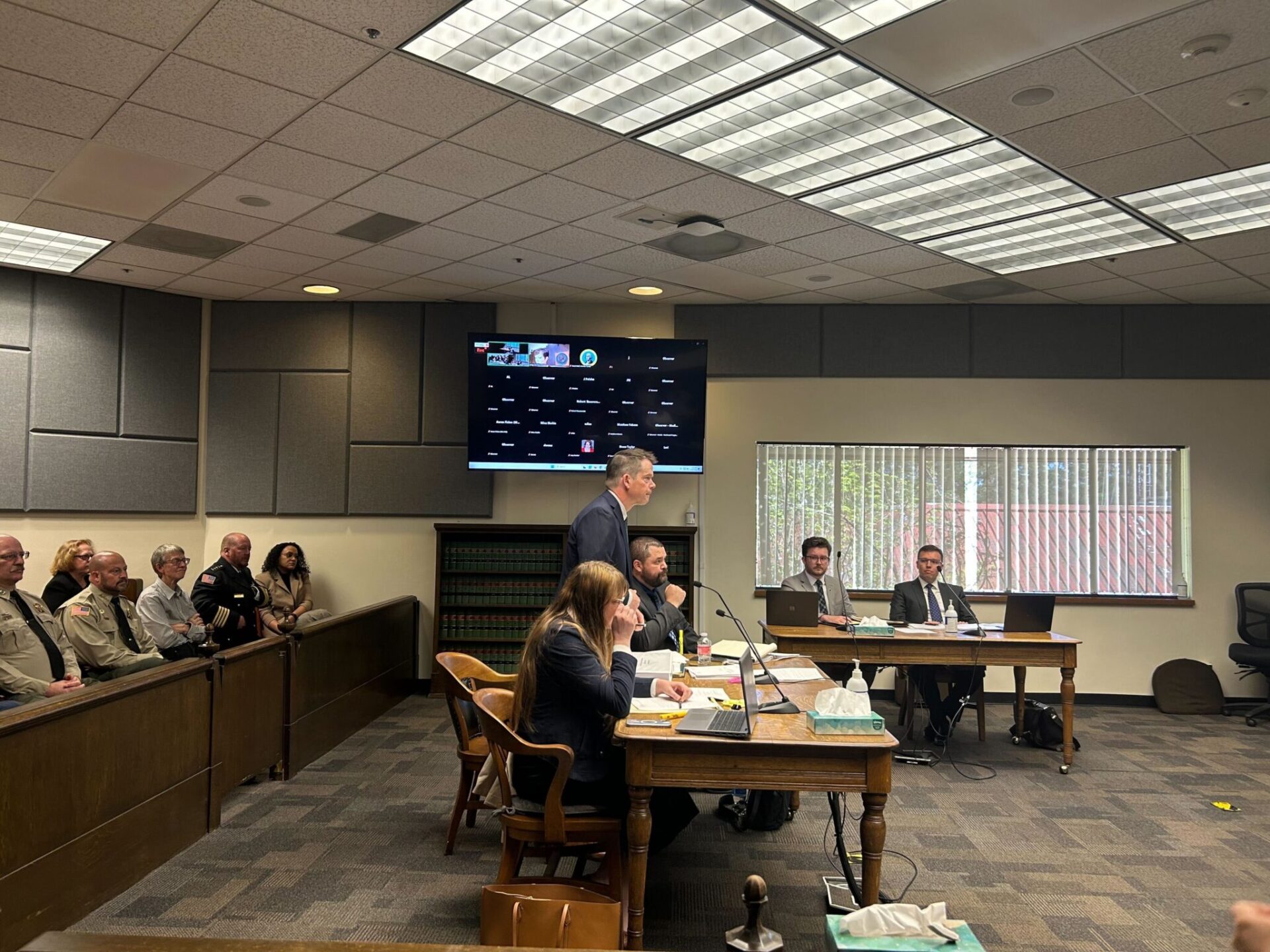 Mark Lamb, the attorney for four eastern Washington sheriffs, speaks in Thurston County Superior Court against a new law setting heightened eligibility standards for sheriffs as several county sheriffs observe on Wednesday, April 29, 2026