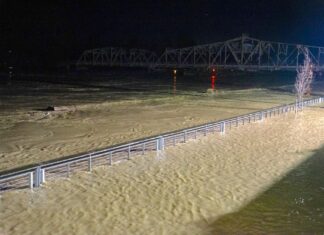 The Skagit River in Mount Vernon hits a record high. One Mount Vernon police officer said the water level had climbed almost a foot in an hour.