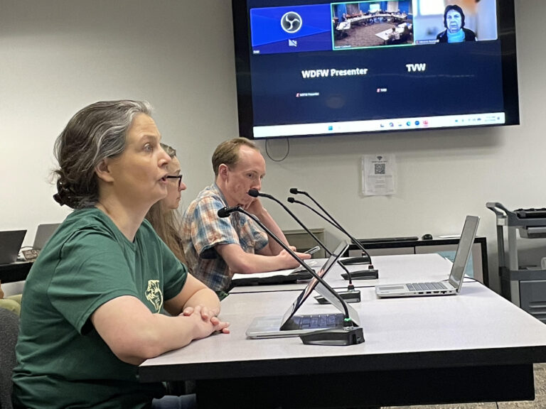 Claire Loebs Davis, founder of Washington Wildlife First, speaks during the public comment period of the April 17, 2026 commission meeting. (Photo by Jerry Cornfield/ Washington State Standard)