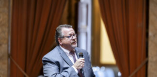 Former state Rep. Eric Robertson speaks on the House floor in 2024