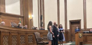Theo Angelis sworn in as WA Supreme Court justice Washington state Supreme Court Justice Theo Angelis dons his robe alongside wife Kim and children Katherine and John as he is sworn in as a justice at the Temple of Justice on Monday, May 18, 2026, in Olympia