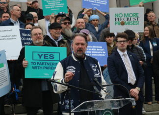 Let’s Go Washington founder Brian Heywood speaks to supporters of his group’s initiatives to bolster parental rights and block transgender athletes from girls’ sports, at the Washington state Capitol, Tuesday, Feb. 3, 2026