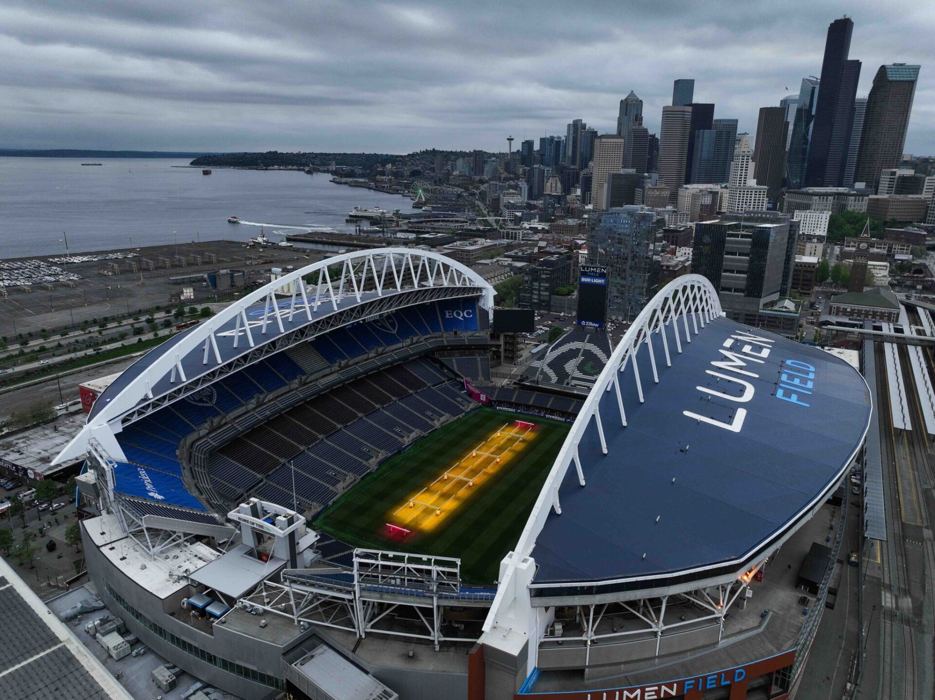 Grass grows beneath lamps during an aerial view of Seattle Stadium on May 6, 2026 in Seattle, Washington. Seattle Stadium, officially named Lumen Field, will host six matches during the 2026 FIFA World Cup.