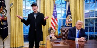 Billionaire Elon Musk, left accompanied by U.S. President Donald Trump, right, and Musk’s son, X Musk, speaks during an executive order signing in the Oval Office at the White House on Feb. 11, 2025 in Washington, D.C.