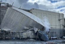 The burst white liquor tank is seen at the Nippon Dynawave Packaging facility in Longview, Wash. on May 26, 2026