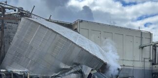 The burst white liquor tank is seen at the Nippon Dynawave Packaging facility in Longview, Wash. on May 26, 2026