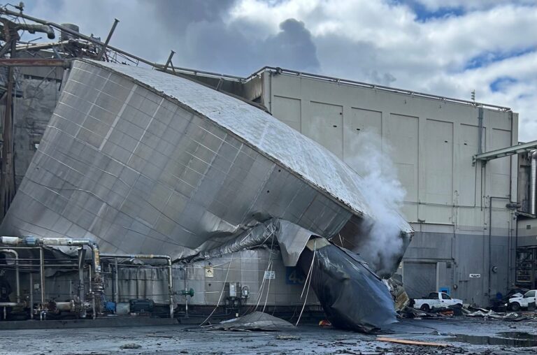 The burst white liquor tank is seen at the Nippon Dynawave Packaging facility in Longview, Wash. on May 26, 2026