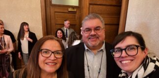 Tim Reynon, center, stepped down as executive director of the Governor's Office of Indian Affairs earlier this month. State Sen. Claudia Kauffman, left, sponsored a new law elevating the office to a cabinet agency for Gov. Bob Ferguson. At right is Jaime Martin, the governor's former external relations director.