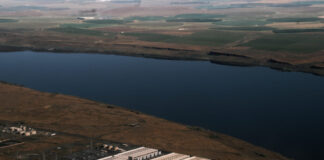 An explosion of data center facilities, including the one pictured here in Umatilla County on May 18, 2026, have been built in Oregon along the Columbia River Gorge during the last few years. The boom has caused a more than 500% load growth for the Umatilla Electric Cooperative during the last decade, which has had to buy more gas and coal-powered electricity on the wholesale market to meet demand