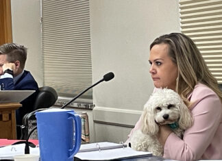 WA lawmaker fights ethics charges in rare public hearing Washington state Rep. Tarra Simmons, D-Bremerton, listens to testimony during a hearing on allegations she violated state ethics laws on June 8, 2026. Simmons denies the charges