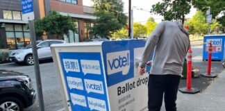 Voting in the Aug. 4 primary has started. Ballots can be put in a designated drop box up until 8 p.m. on Election Day. Mailed ballots must be postmarked on or before Election Day to be counted. (Photo by Laurel Demkovich / Washington State Standard)