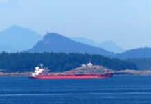 Increased tanker traffic through the shared border waters of Washington and British Columbia could rise further if Alberta succeeds in building a new crude export pipeline to the West Coast. Here, an oil/chemical tanker steers through Boundary Pass on the way to the Port of Vancouver in late June