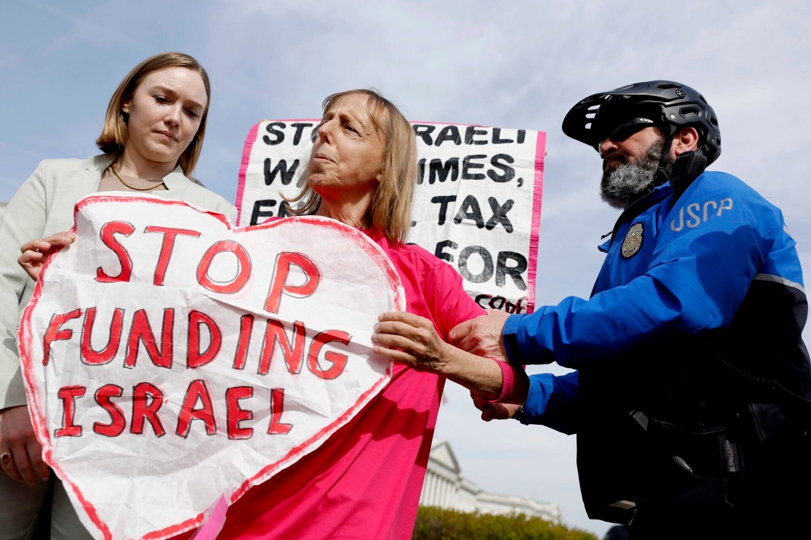 A protester against providing U.S. funding to Israel seen during a news conference outside the U.S. Capitol building in 2024. Divisions within the Democratic Party over U.S. support for Israel are increasingly visible in Washington state. (Photo by Anna Moneymaker/Getty Images)