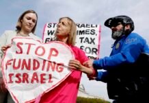 A protester against providing U.S. funding to Israel seen during a news conference outside the U.S. Capitol building in 2024. Divisions within the Democratic Party over U.S. support for Israel are increasingly visible in Washington state. (Photo by Anna Moneymaker/Getty Images)