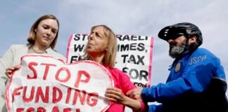 A protester against providing U.S. funding to Israel seen during a news conference outside the U.S. Capitol building in 2024. Divisions within the Democratic Party over U.S. support for Israel are increasingly visible in Washington state. (Photo by Anna Moneymaker/Getty Images)