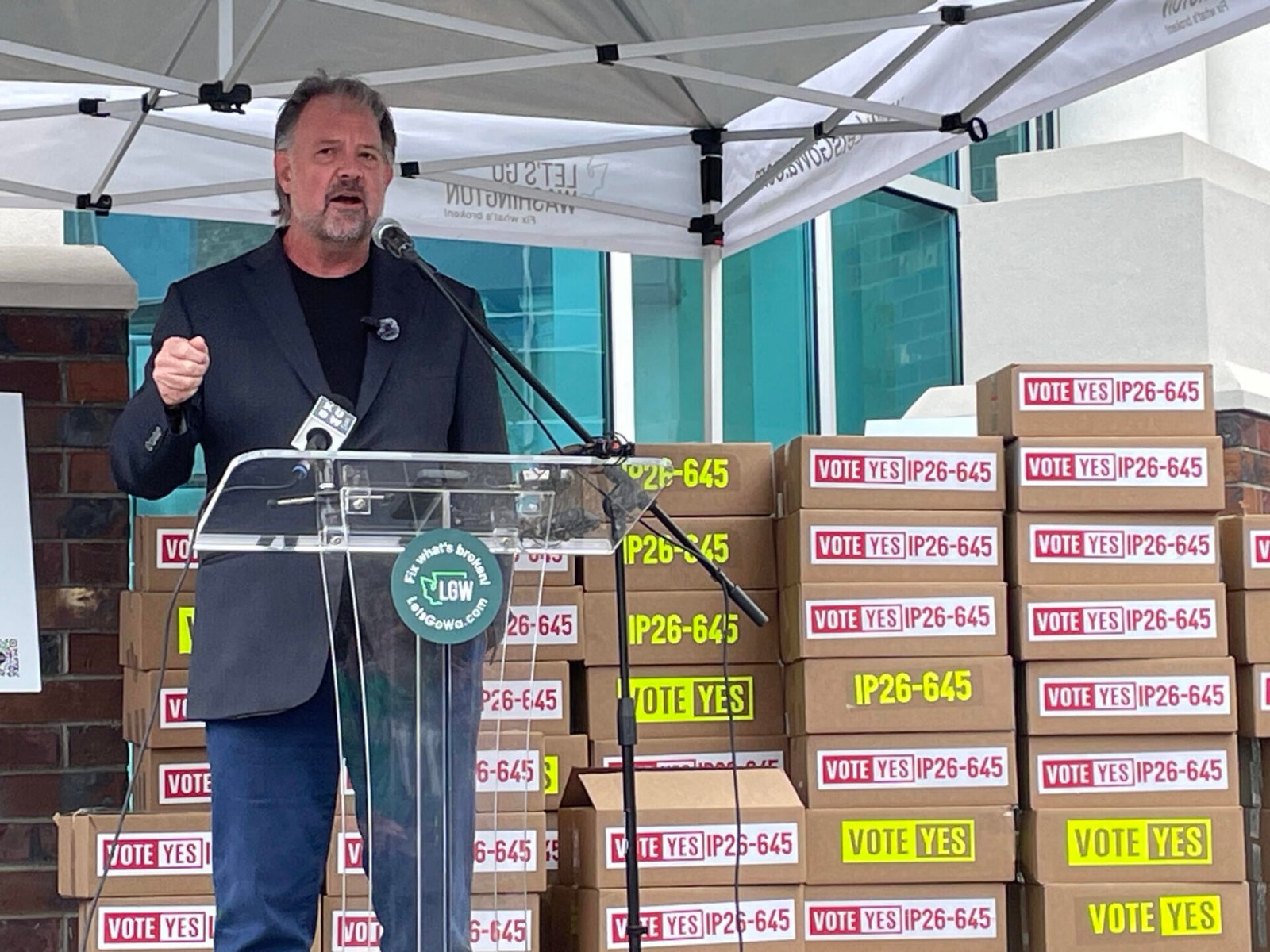 Brian Heywood, leader of Let's Go Washington, speaks at a press conference in Tumwater, Wash. on July 2, 2026 before the group turned in signatures for Initiative 645. (Photo by Jerry Cornfield/Washington State Standard)